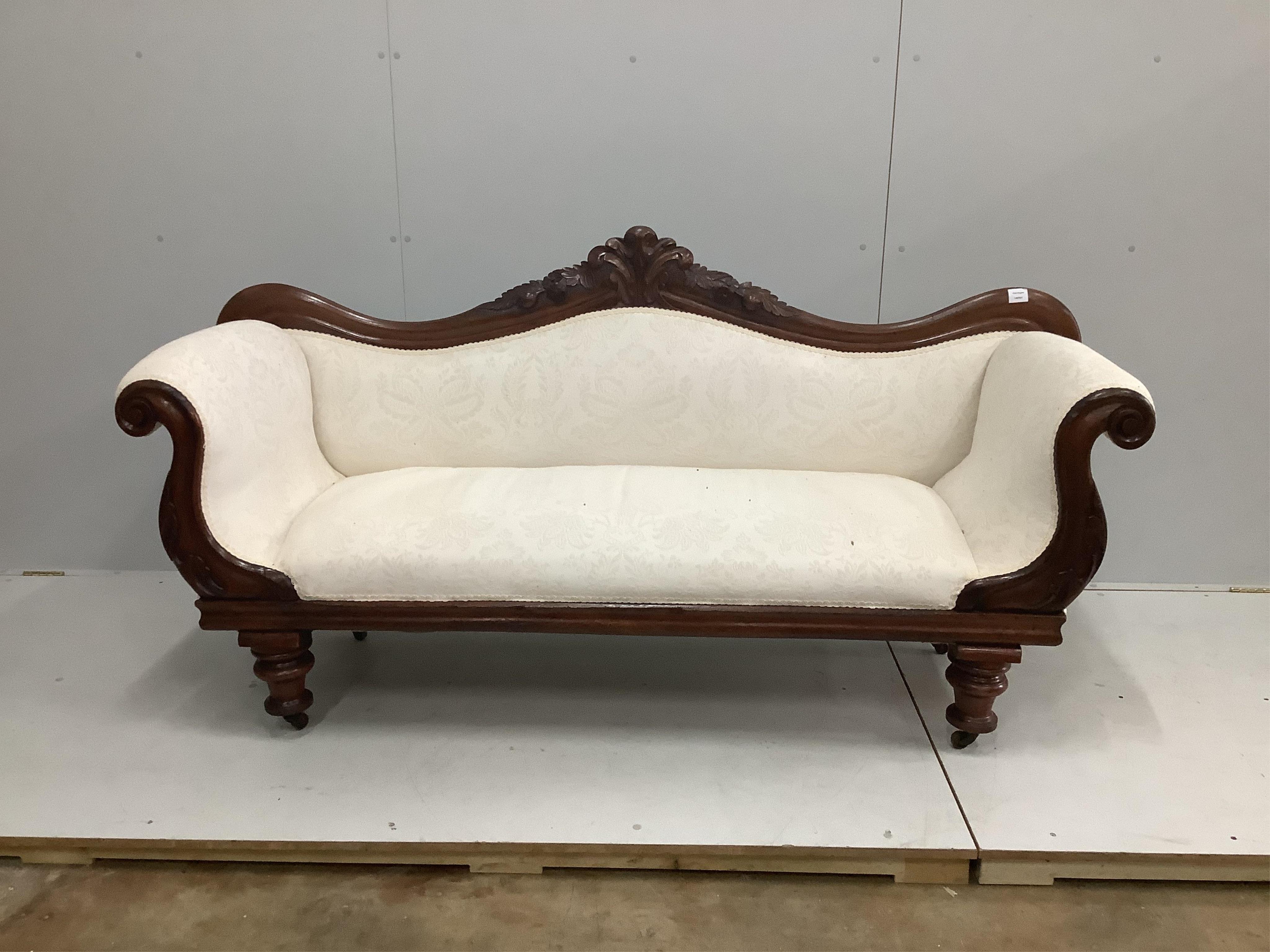 A Victorian mahogany scroll arm settee, width 194cm, depth 59cm, height 96cm. Condition - good